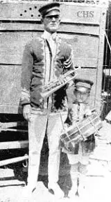 Christy Bros. Circus bandleader Everett James shown in 1922 with his son Harry James.