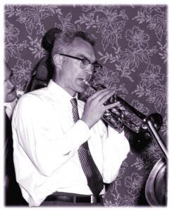 Oxtot is remembered as a band leader, banjo player, fine singer and popular entertainer in several genres. He played cornet into the mid-1960s. Pioneer Village, East Bay c. 1958.