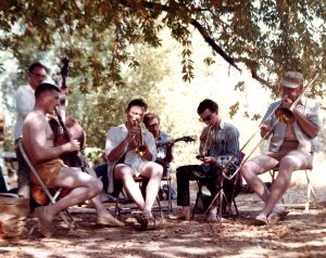 Impromptu campground group, probably Northern California, c. 1966. L to R: Jim Cumming (bass), Earl Scheelar (clarinet), Jerry Blumberg (trumpet), Paul Berg (guitar), unknown cornetist and Bob Mielke (trombone).
