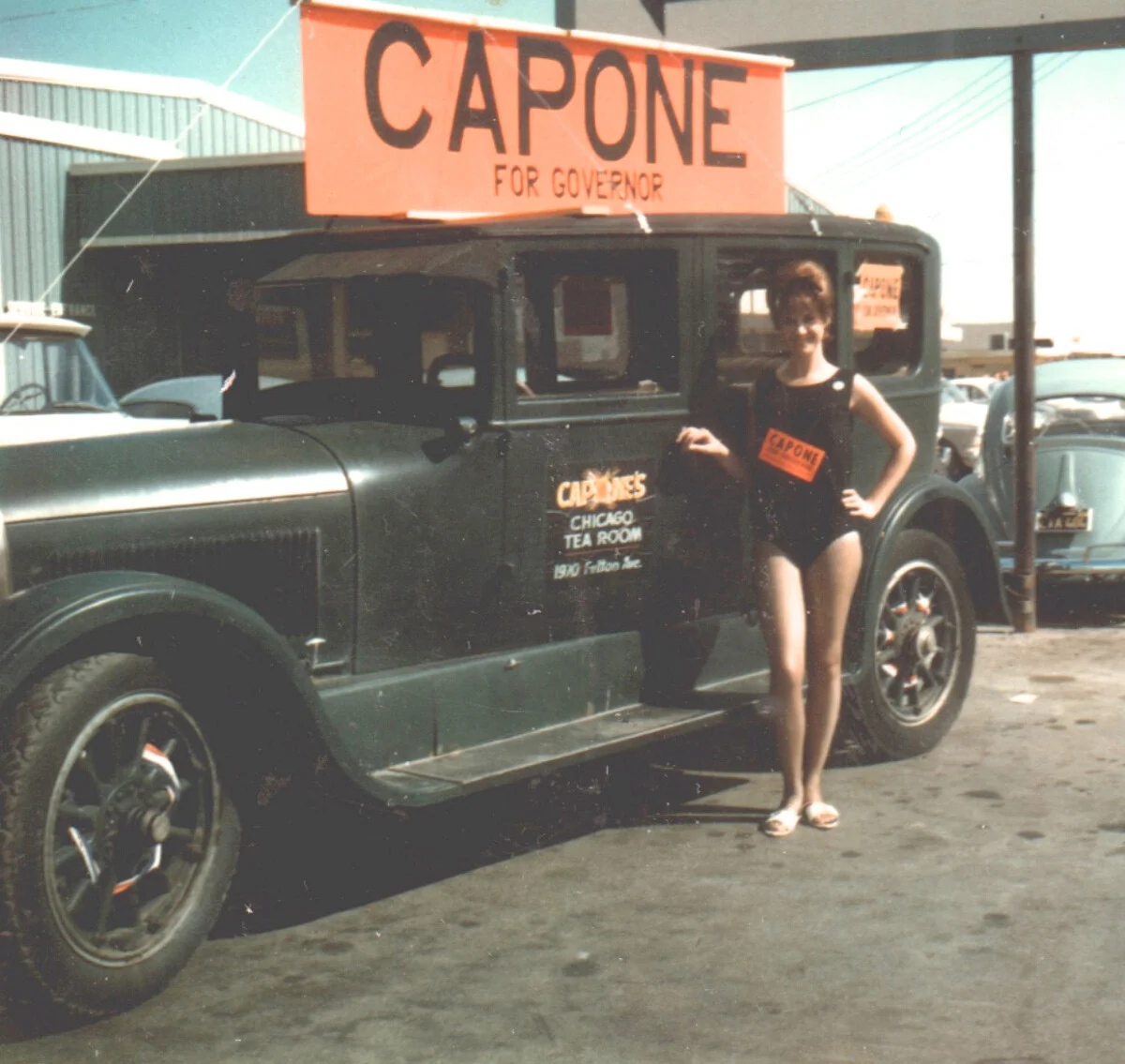 Capone's old car w- girl and campaign sign