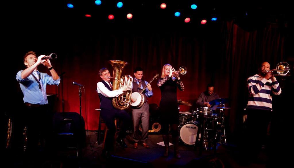 The Louis Armstrong Eternity Band keeps the traditional jazz flame alive at NYC’s Birdland. From left: Adrian Cunningham, clarinet; David Ostwald, tuba; Vinny Raniolo, banjo; Bria Skonberg, trumpet; Marion Felder, drums; and Dion Tucker, trombone. (photo by Michael Friedman)