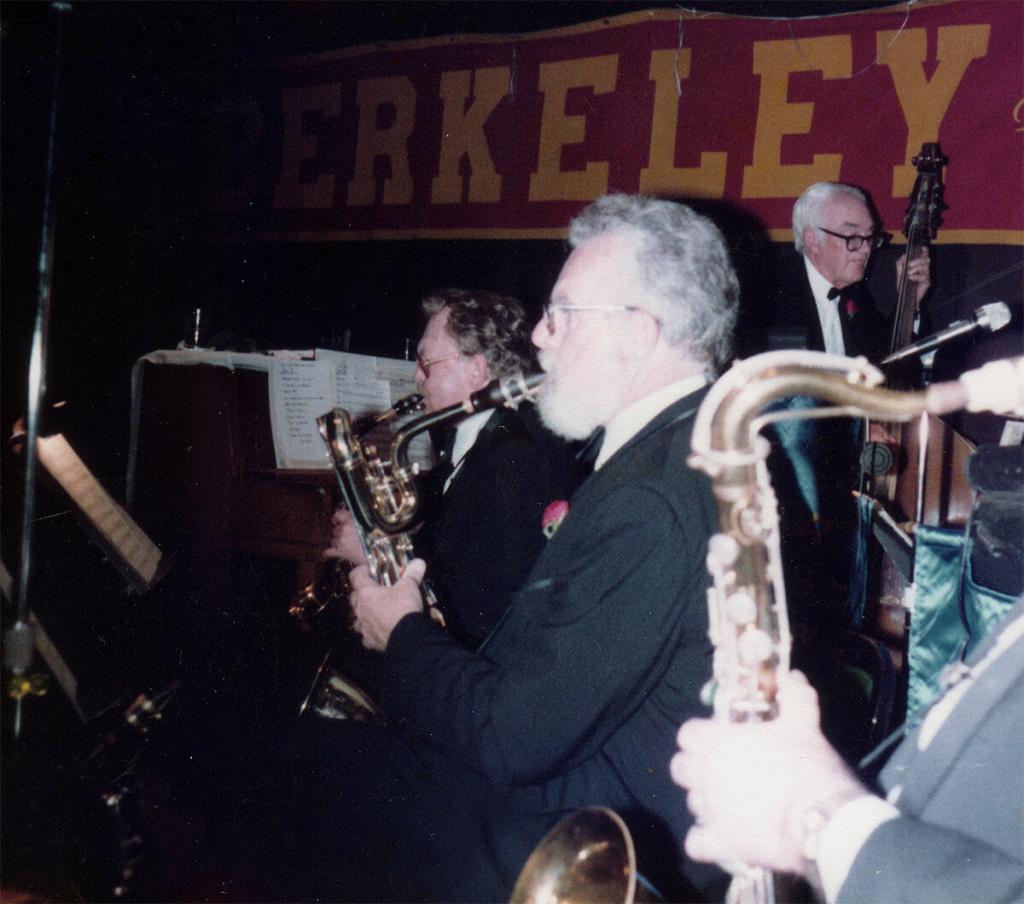 Pete Allen is seen playing baritone saxophone (center) and Dick Oxtot string bass in the Harbor Lights dance orchestra.