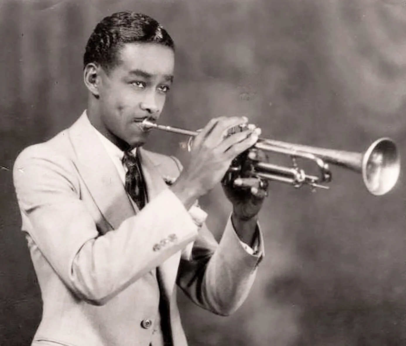 First professional trumpet gig in 1933 at age 21.