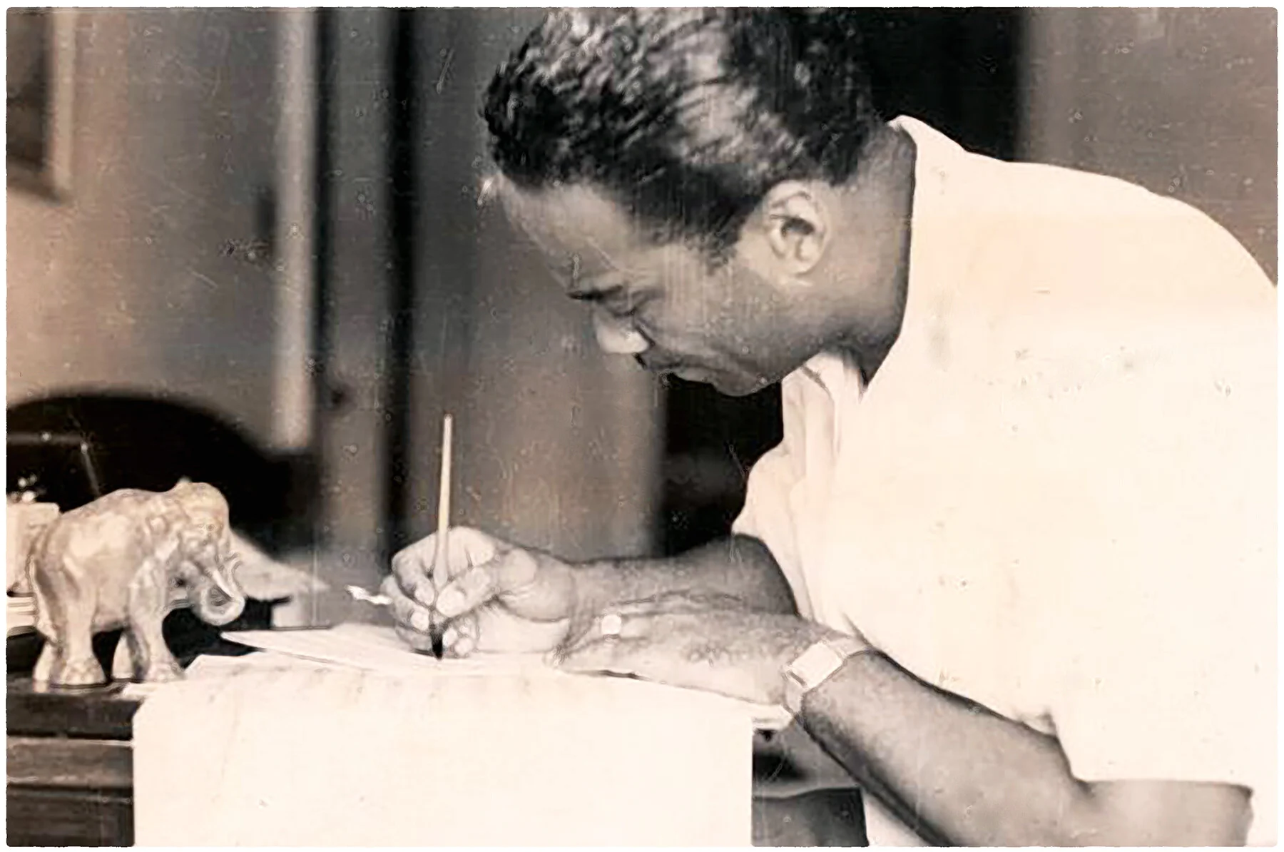 Buck composing or arranging, probably in China.