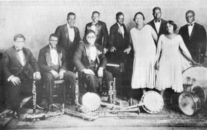 Clarence Williams and his Orchestra - left to right - Albert Socarras, Prince Robinson, Cyrus St. Clair, Clarence Williams, Buddy Christian, Charlie Irvis, Sara Martin, Floyd Casey, Eva Taylor, Ed Allen.