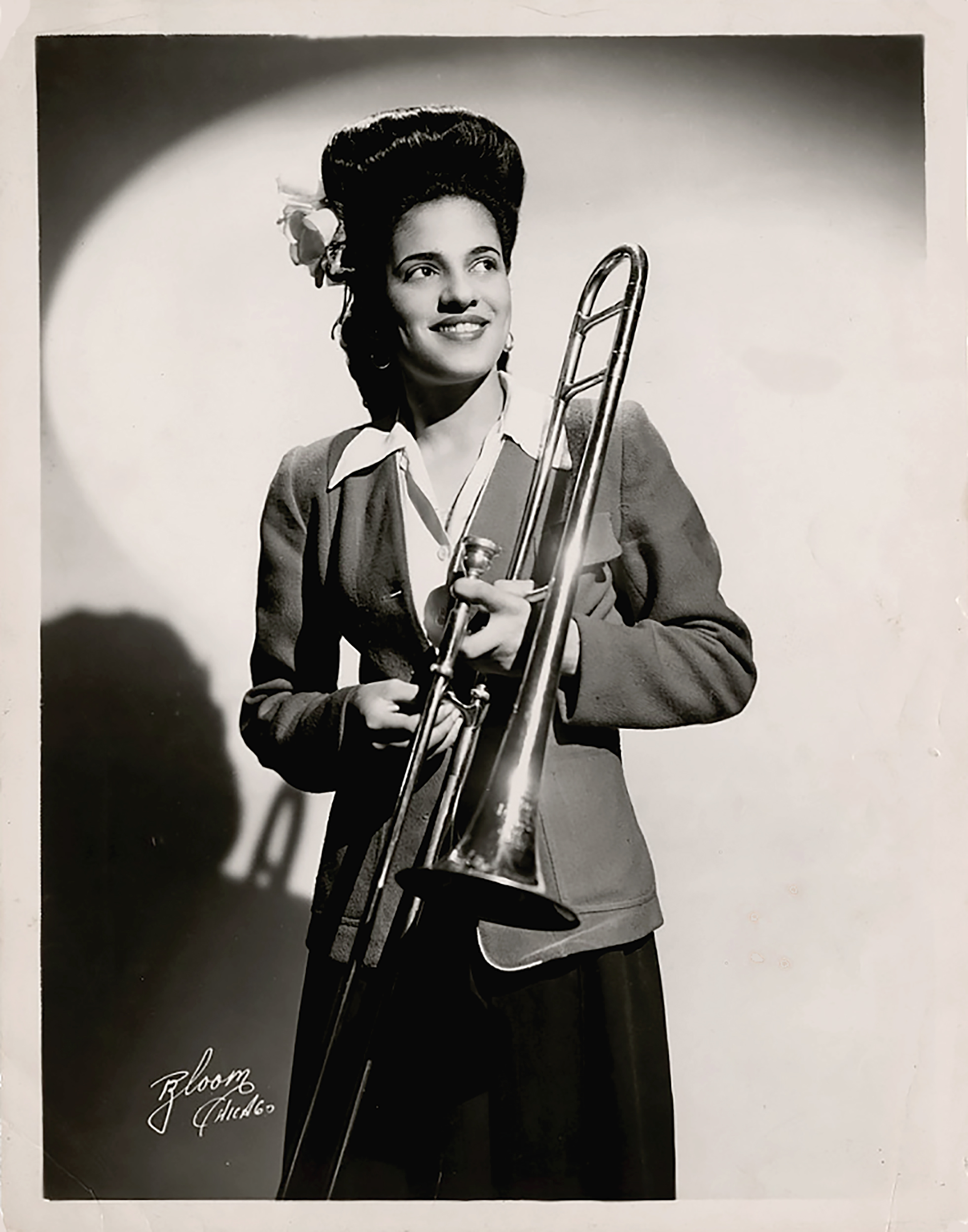 NMAH Archives CenterInternational Sweethearts of Rhythm Collection 1218 Series 3: Dixie Hardy Moon Materials Box 3 Folder 2 Photographer Stamp: Bloom Chicago Member of the International Sweethearts of Rhythm, trombonist