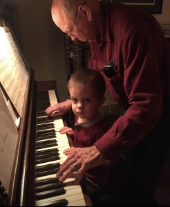 Jim Radloff and grandson at the piano.