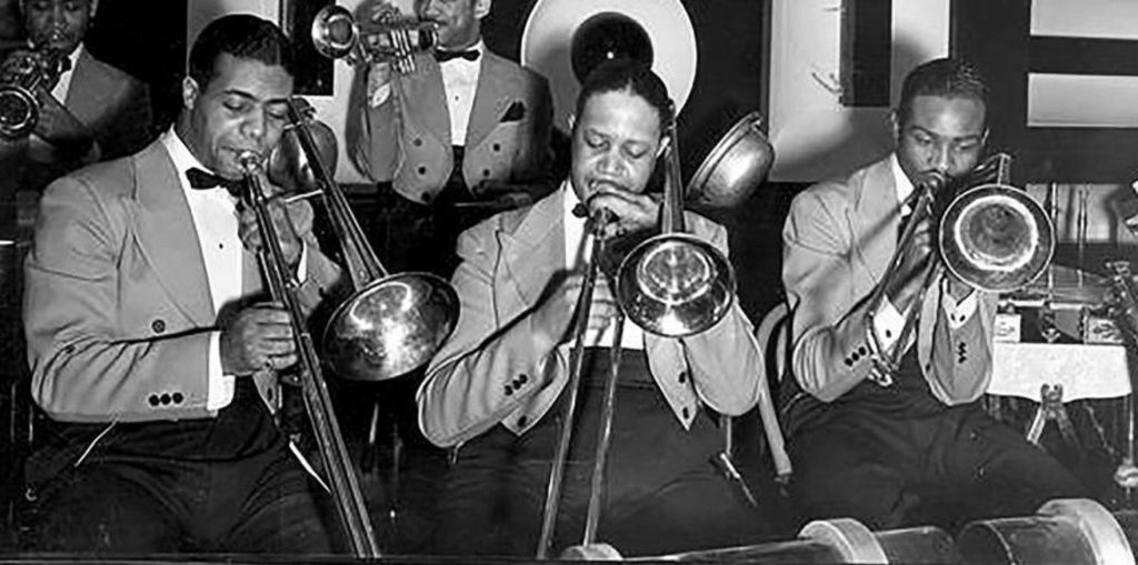 Circa 1938 Count Basie trombone section, from left: Benny Morton, Dan Minor, and Eddie Durham.